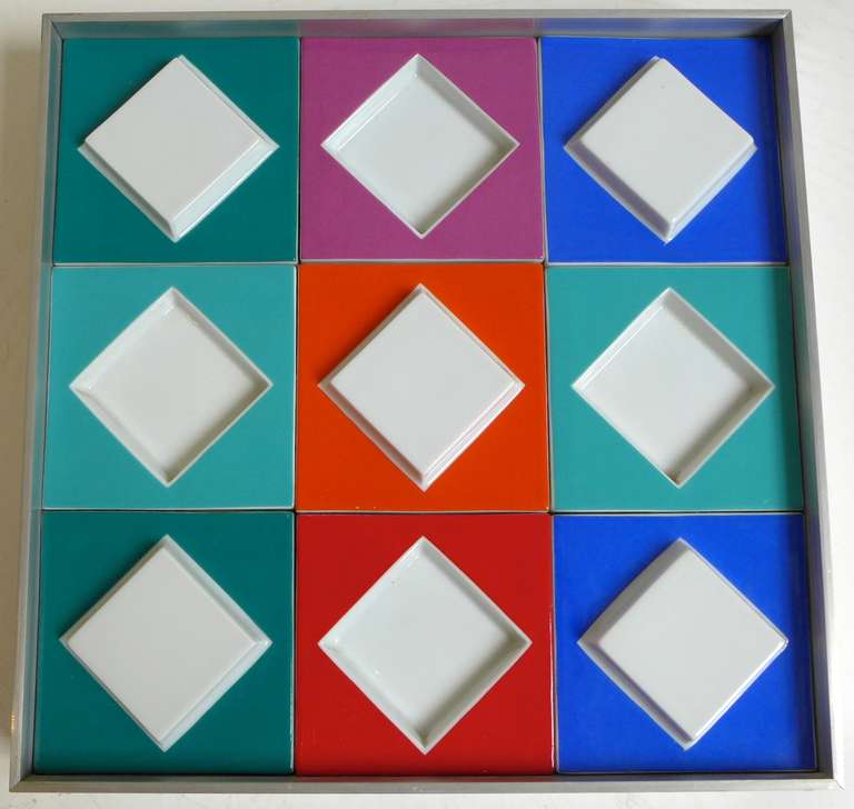 Porcelain relief composition of nine tiles in an aluminum frame by Op Art master Victor Vasarely.  A Studio Line production by Rosenthal in an edition of 100, c. 1970's.  Signed and numbered on a plaque on the reverse.