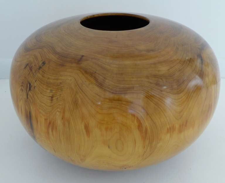 Monumental turned wood vessel by Atlanta, GA artist Ed Moulthrop (1916-2003). An architect by training, Moulthrop was renowned for his simple, elegant vessels that showcased Southern woods, in this case Carolina cypress. Bears the artist's name,
