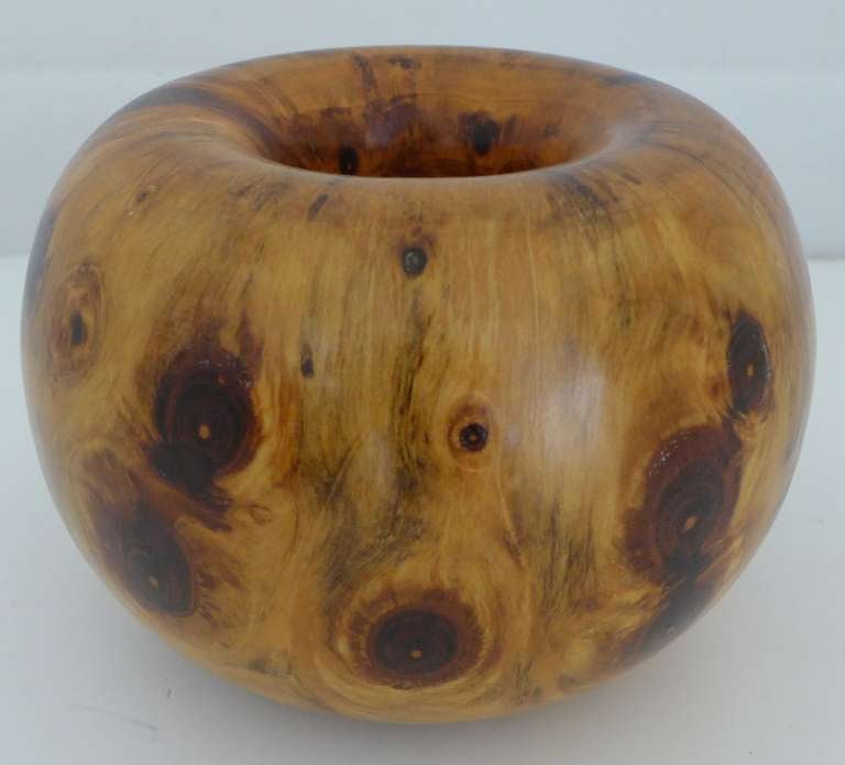 Highly figured turned wood vessel of white pine by Atlanta, GA artist Ed Moulthrop (1916-2003).  An architect by training, Moullthrop was renowned for his simple, elegant vessels that showcased Southern woods. Bears the artist's cypher.  From the