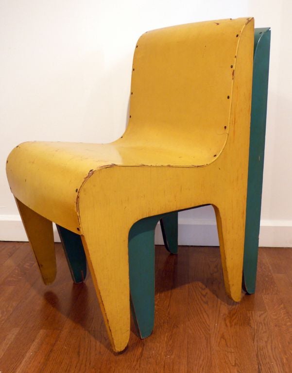 Two prototype, museum-quality, masonite and plywood stacking chairs, by Austrian born and Cleveland-based designer Henry P. Glass. Part of the 