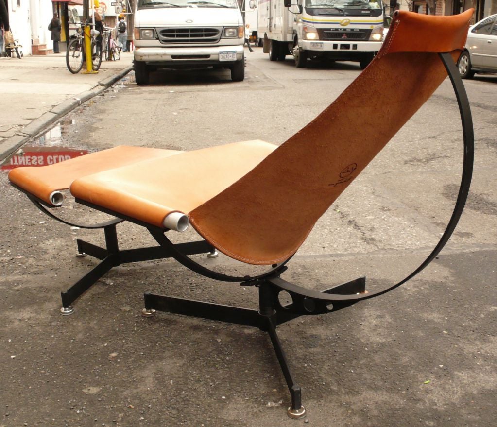 New production of iconic mid-century sling chair and ottoman by Arizona industrial designer Max Gottschalk, in saddle leather, steel, and tubular aluminum.  Produced by the same artisans who made the chair in the 1970's, and sold through the