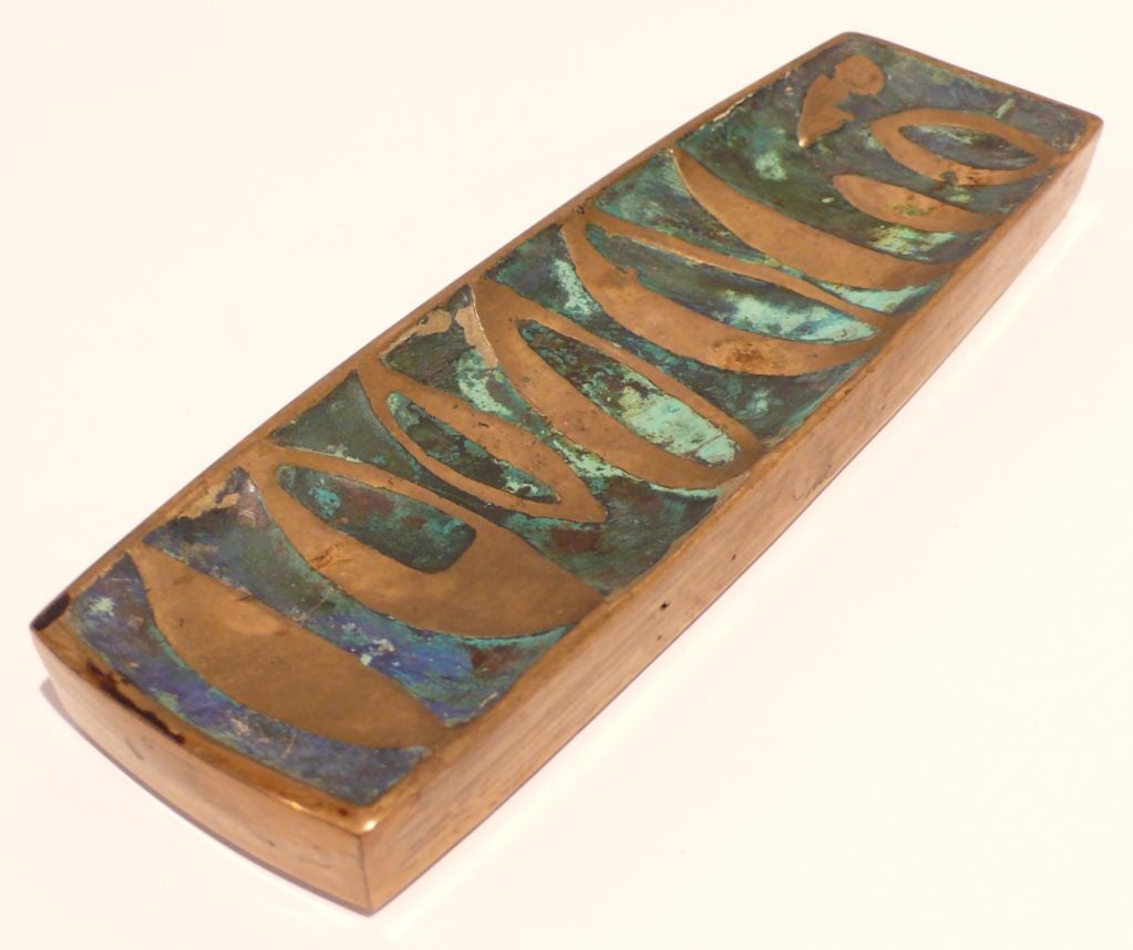 Narrow footed dish with abstract motif in brass and turquoise ceramic by Mexican designer/artist Pepe Mendoza, produced c. 1958.  Marked with artist's name and a 1958 copyright date.