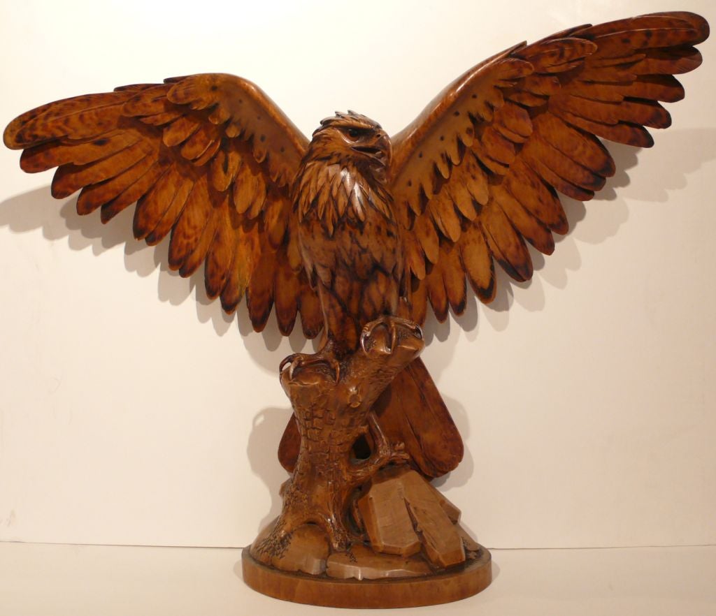 Beautifully hand-carved wooden eagle with 25