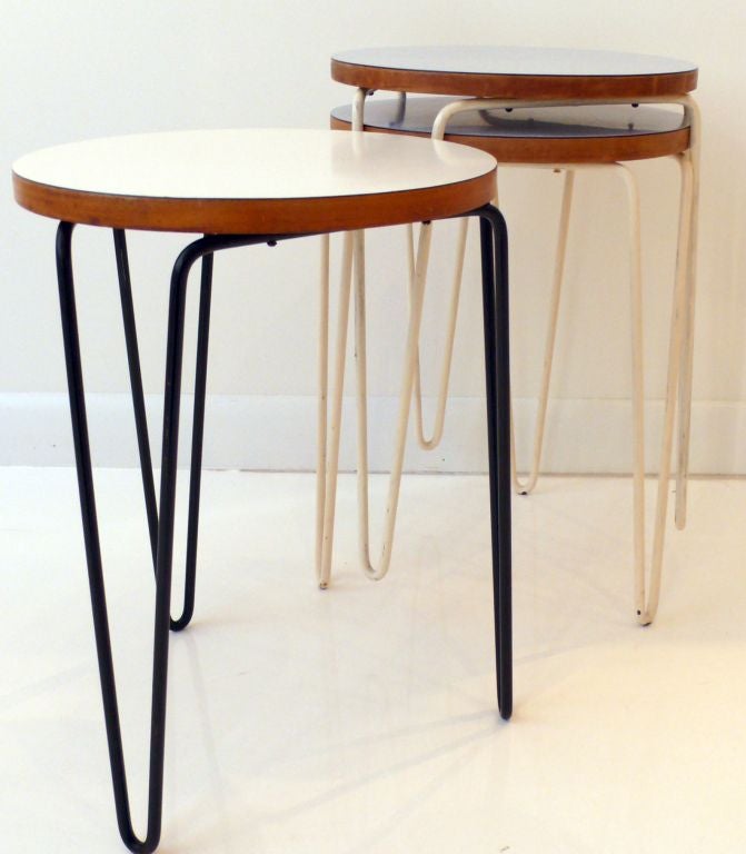 Three stacking stools of laminated birch with micarta tops and hairpin metal legs designed by Florence Knoll in 1947.  These were produced by an early Knoll fabricator around 1950, making use of the (then) new micarta laminates.  The white micarta