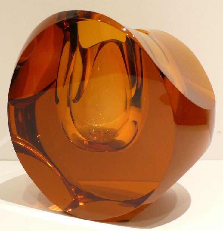 Amber cut-glass vase by Czech designer Frantisek Zemek.  Part of a series of such designs done for Moser in the late 1950's.  With impressed Moser mark.  Excellent original condition, with only a tiny scuff (pictured) along one bottom edge.