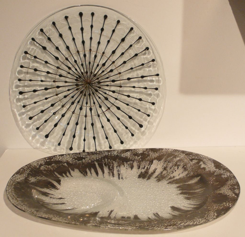 An early Frances and Michael Higgins fused glass platter, c. 1950's, with the figural mark and the incised signature indicative of an earlier studio piece.  In beautiful original condition.  And a Dorothy Thorpe sand-cast glass segmented serving