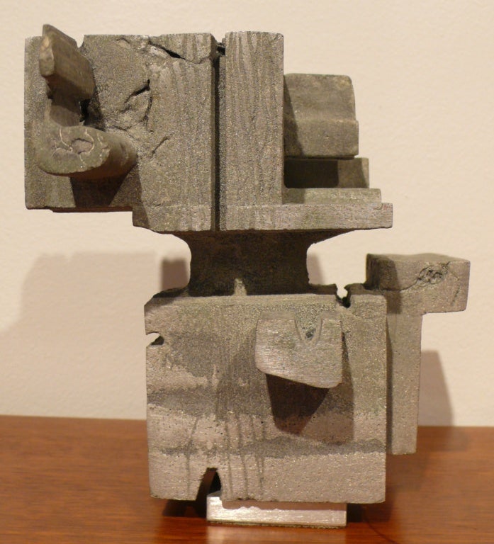 Hand-built abstract sculpture of cast aluminum elements by Cleveland artist and designer Donald Drumm.  A nice example of early 1970's brutalism with an architectural bearing--the oxidized aluminum looks like beton brut, to boot.  An interesting