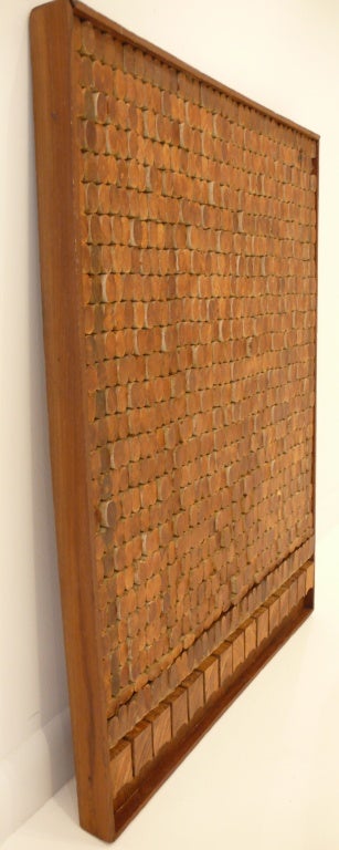Abstract wall relief of sawn, stained, and collaged wood by Lithuanian-born American artist Josef Twirbutt. A work that shows subtle color and texture variations. A practicing architect as well as artist, Twirbutt arrived in New York City in 1959