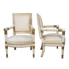 A Set of Eight Painted and Parcel Gilt Empire Armchairs