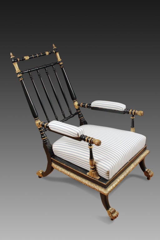 An Ebonized and Parcel Gilt Armchair