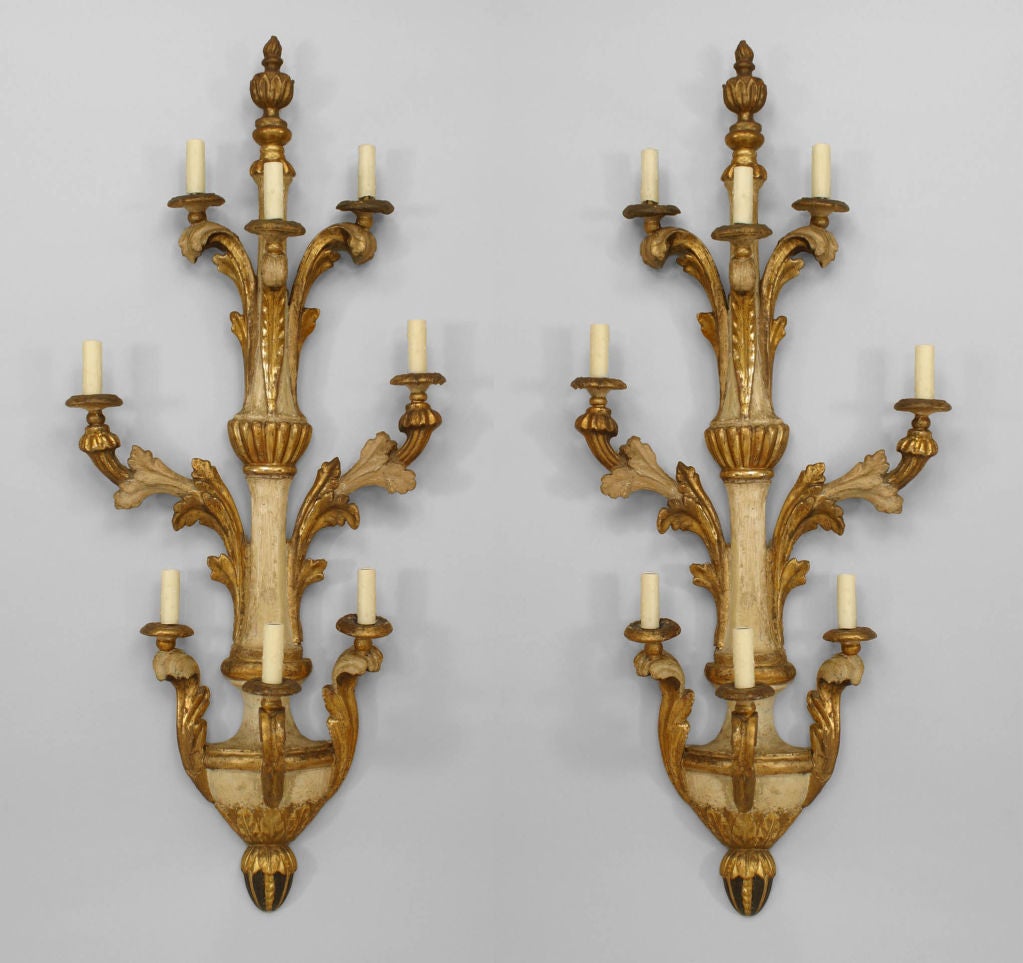 A Pair of Italian Neoclassic White Painted Parcel Gilt 8 Light