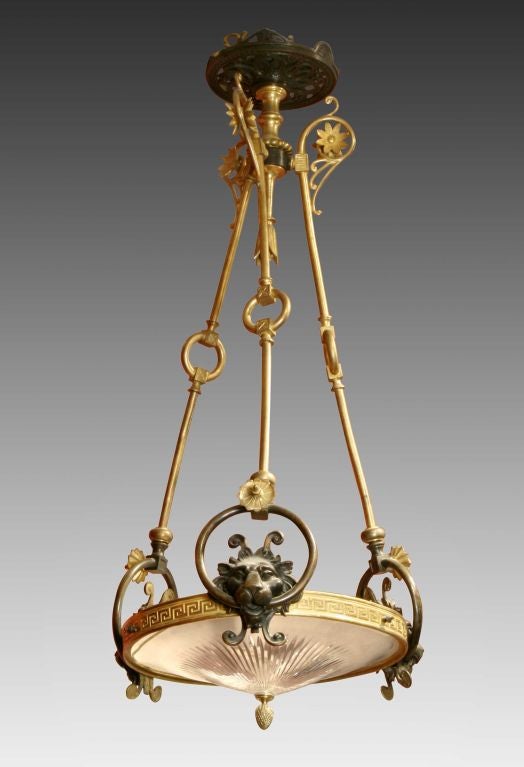 A Regency Glass Ormolu and Patinated Bronze Chandelier
