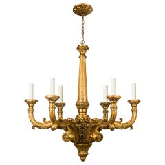 A six-light gilded wood chandelier