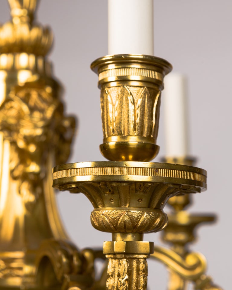 American Six Arm Gilded Bronze Chandelier with Ram's Heads and Foliate Details, ca 1910s For Sale