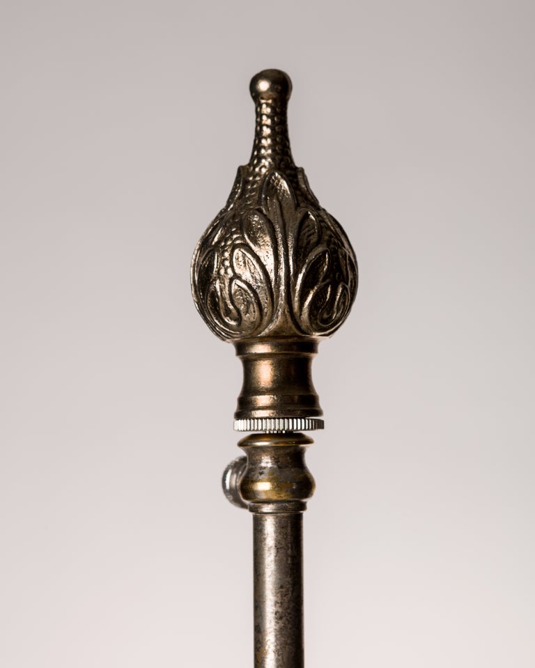 ATL1848

A neoclassical style foliate detailed table lamp in its original age-worn silverplate over copper finish, attributed to the New York maker E. F. Caldwell Co.

Dimensions:
Overall: 27