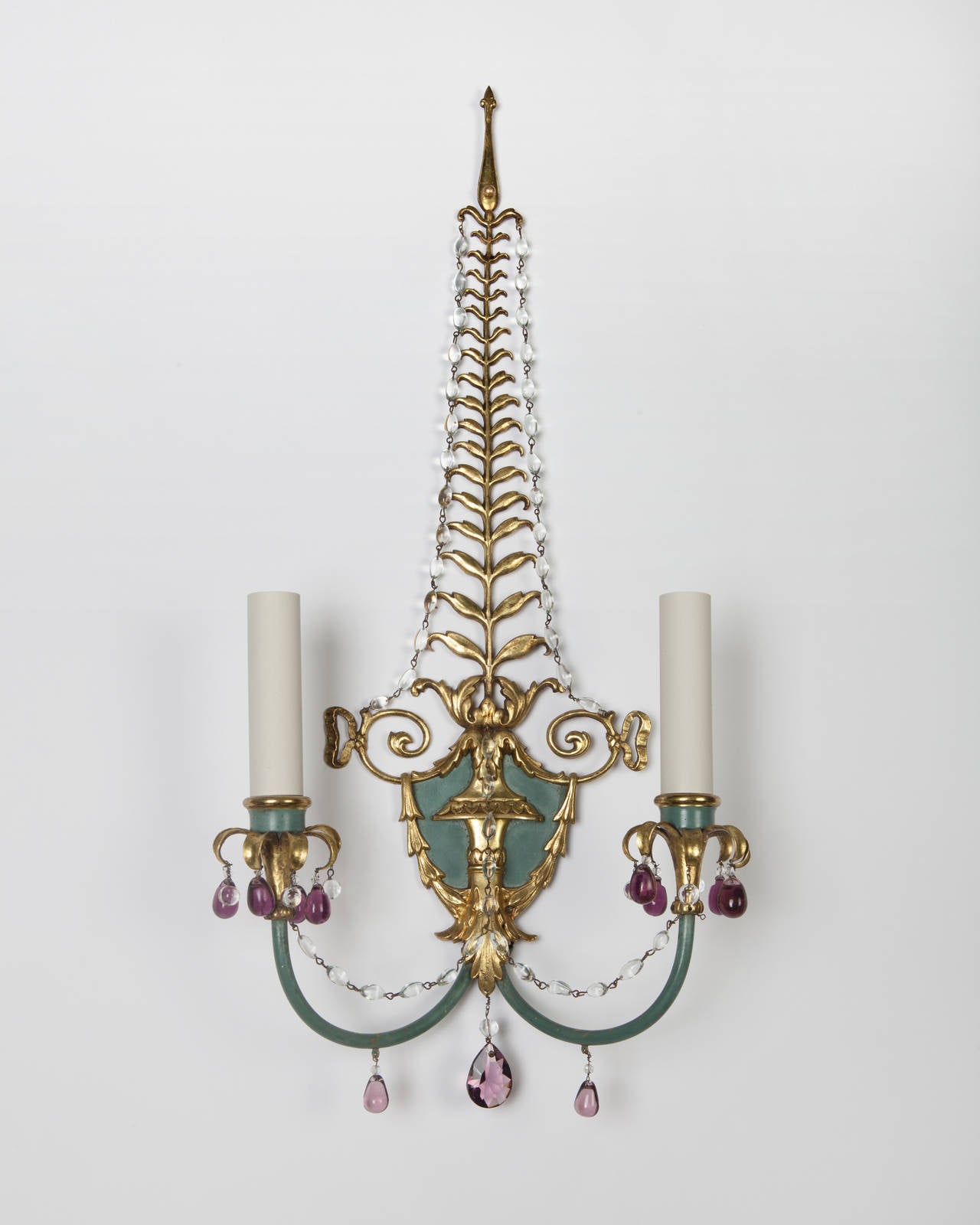 AIS2902

Circa 1920
A pair of antique double light sconces in their original gilded and enameled brass finish. Dressed with beaded swags and amethyst prisms. By the maker H. W. Kaufman Co.

Dimensions:
Overall: 23