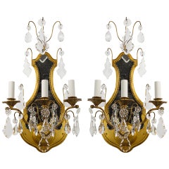 Antique A pair of gilded mirrorback sconces