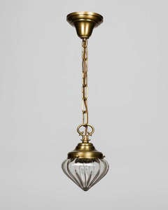 A ribbed, wheel-cut glass pendant