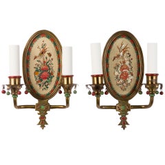 A pair of painted two-arm sconces