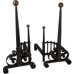 Large wrought iron and brass andirons