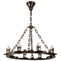 An antique eight-light iron hoop chandelier