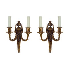 A pair of gilt bronze E. F. Caldwell sconces