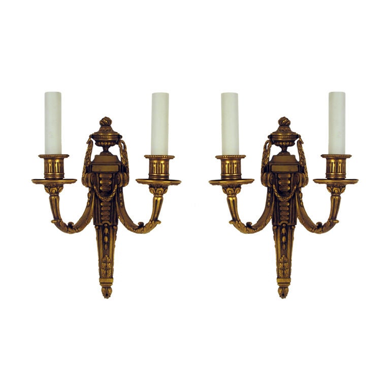 A pair of gilt bronze E. F. Caldwell sconces