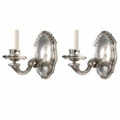 An antique pair of Mitchell Vance Co. silvered sconce