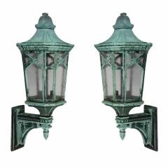 An Antique pair of large exterior wall lanterns