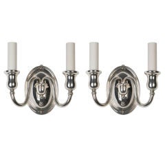 A pair of Antique silverplate sconces