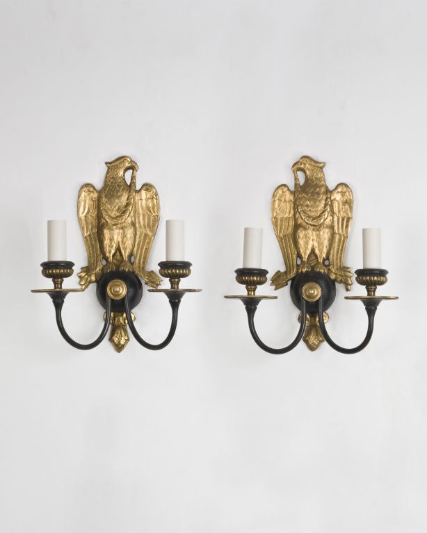 A pair of two arm E. F. Caldwell eagle sconces