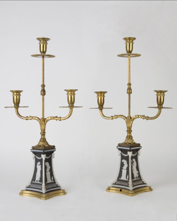 ACS0502
A pair of three arm bronze candelabra with pierced bobeches and slender arms on Wedgwood ceramic jasperware bases. Signed by the New York maker E. F. Caldwell.

Dimensions:
Overall: 18-1/4