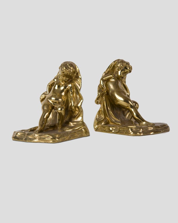ATA1390
A pair of polished bronze cherub bookends signed by the New York maker Sterling Bronze Co.

Overall: 3-1/2