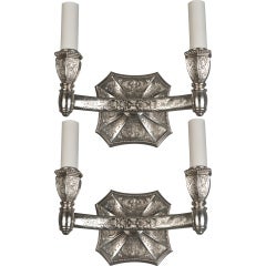A pair of two arm silver sconces by E. F. Caldwell