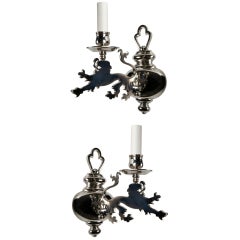 A pair of rampant lion sconces by E. F. Caldwell