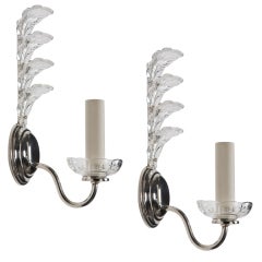 A pair of crystal and glass sconces