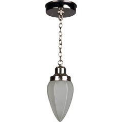 A hexagonal bullet-shaped frosted glass pendant