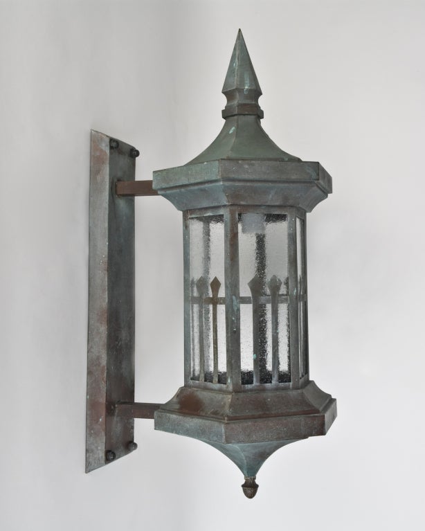 A pair of verdigris wall lanterns