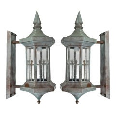 A pair of verdigris wall lanterns