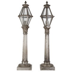 A pair of silverplated pier-mounted lanterns