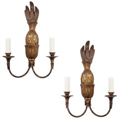 A pair of gilt wood pineapple sconces