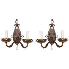 A Pair Of Wrought Iron And Crystal Sconces