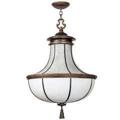 A Large Bronze And Leaded Glass Pendant