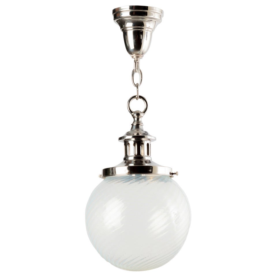 A Vintage Swirled Opalescent Glass Pendant on Industrial Nickel Fittings c. 1900 For Sale