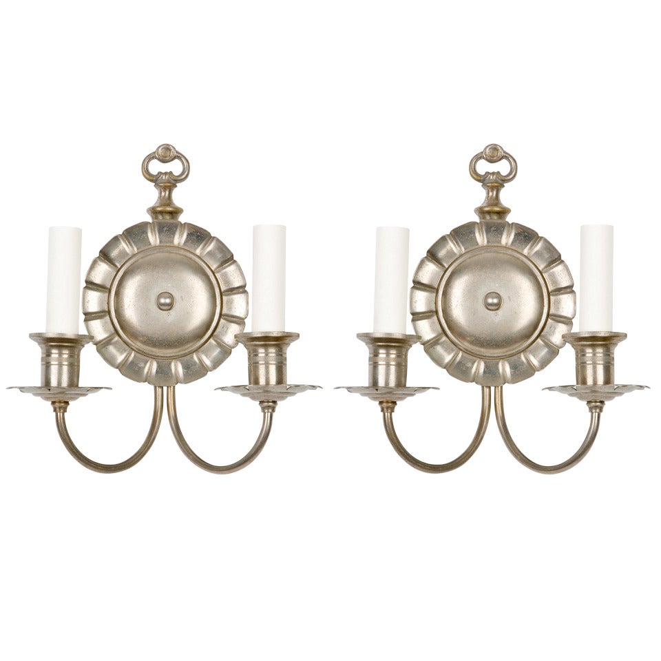 A Pair Of Two Arm Aged Nickel Sconces with Pie-Crust Edge Backplates