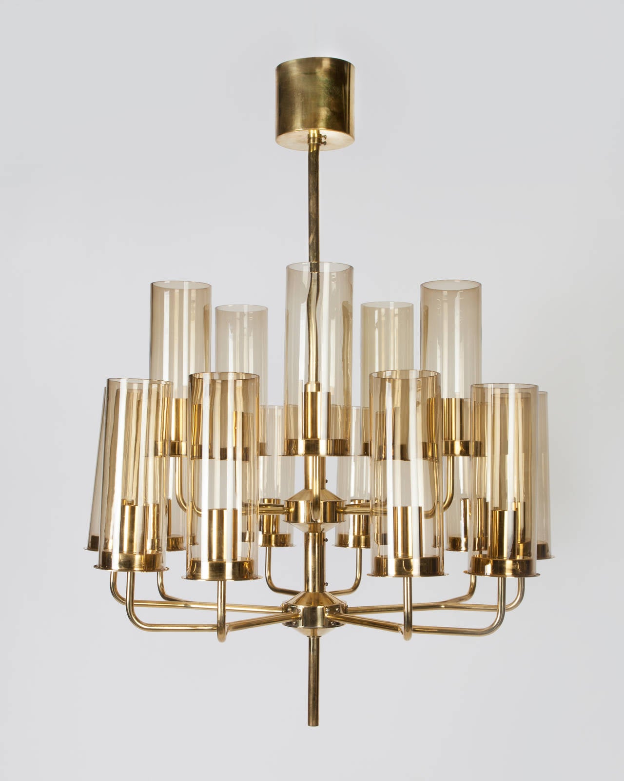 AHL3913

circa 1970
A fifteen-light chandelier with smoked glass shades in its original brass finish. By the Swedish maker Hans-Agne Jakobsson. Due to the antique nature of this fixture, there may be some nicks or imperfections in the