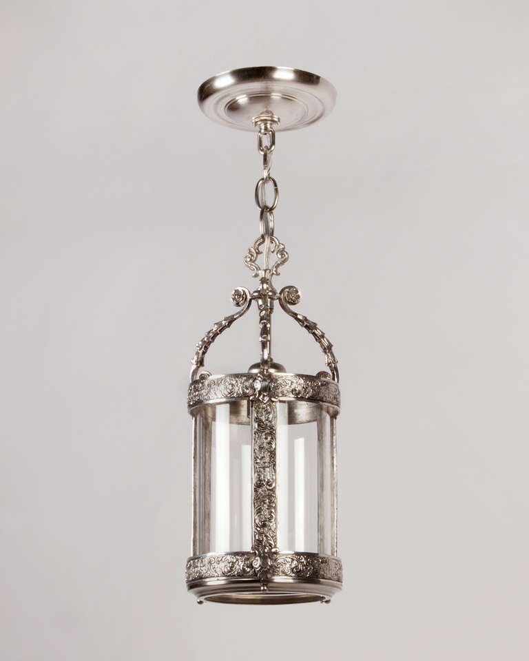 AHL3840

Circa 1920

A petite lantern with bellflower scrolls and low relief foliate textured surfaces, in its original aged silverplate finish. Having a clear cylindrical glass lens.

Dimensions:
Current height: 52-3/4