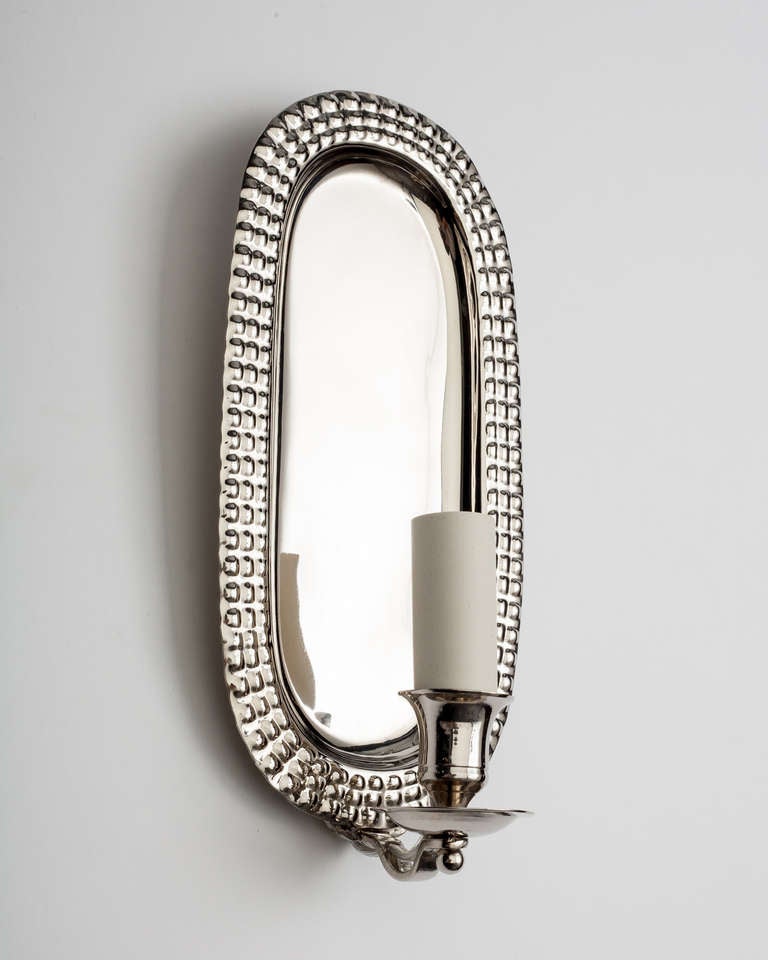 A Pair Of Oval Repousee Nickel-plated Sconces