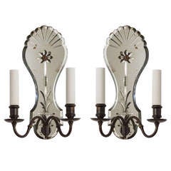 A Pair Of Wheel-cut Mirrored Sconces