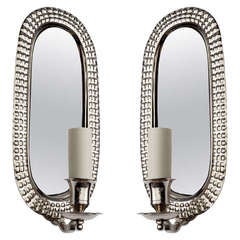 A Pair Of Oval Repousee Nickel-plated Sconces